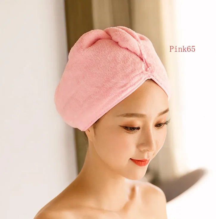 Women's microfiber hair dryer cap in assorted colours for absorbing wet hair.