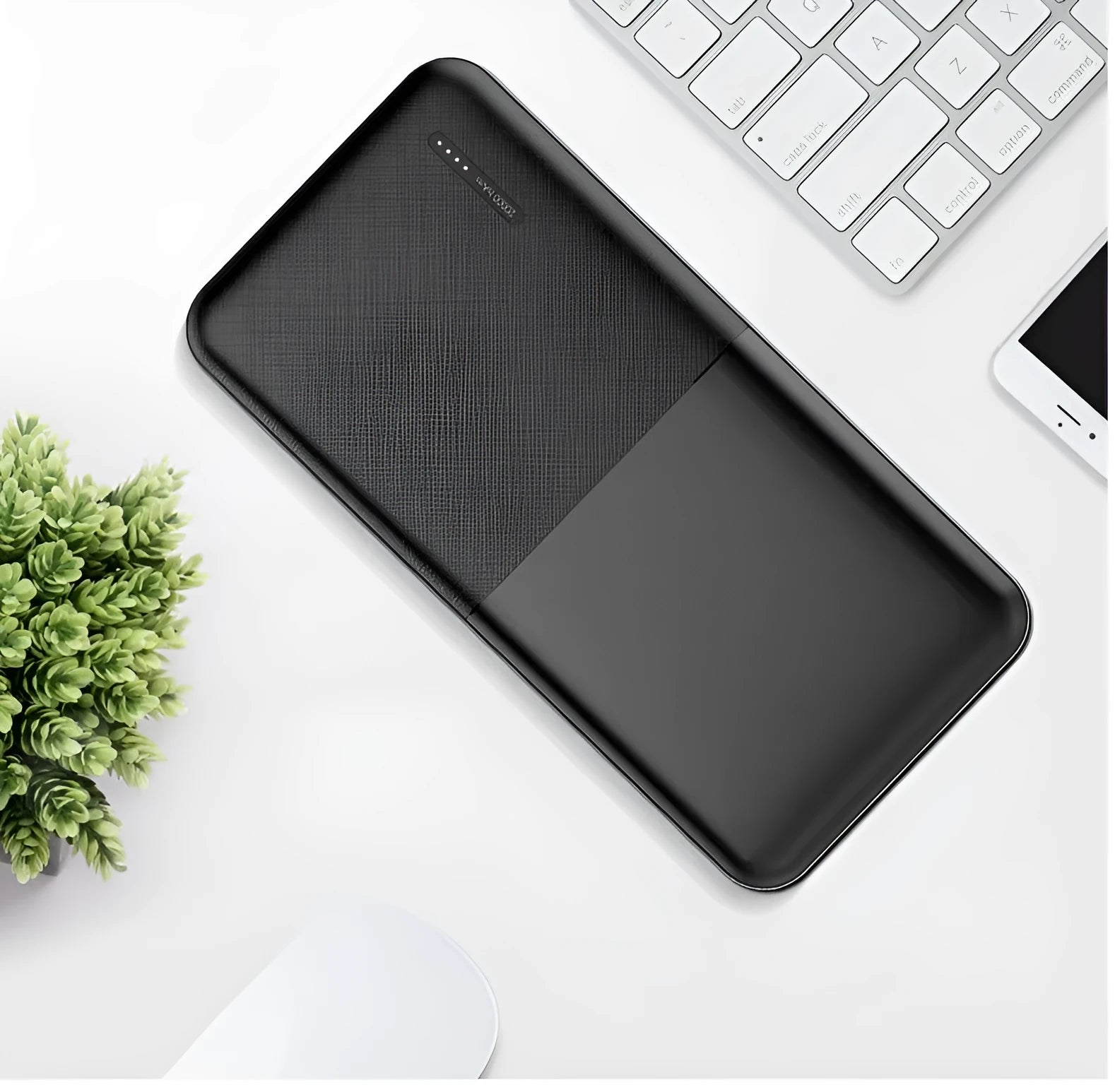 Black and white 20000 mAh power bank with multiple USB ports and plastic casing