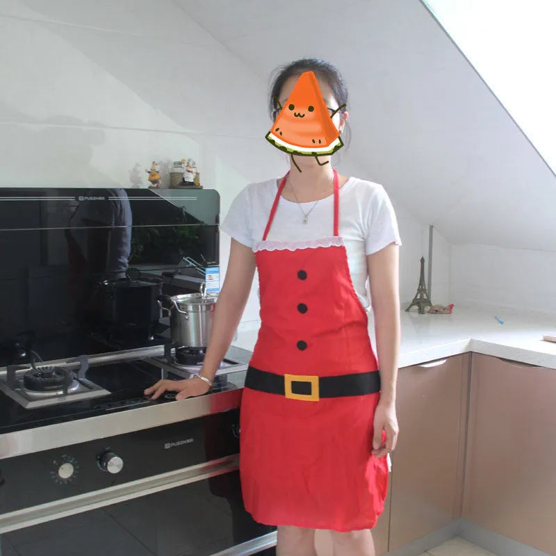 Red polyester Christmas apron with Merry Christmas text, shown in adult and children's sizes.