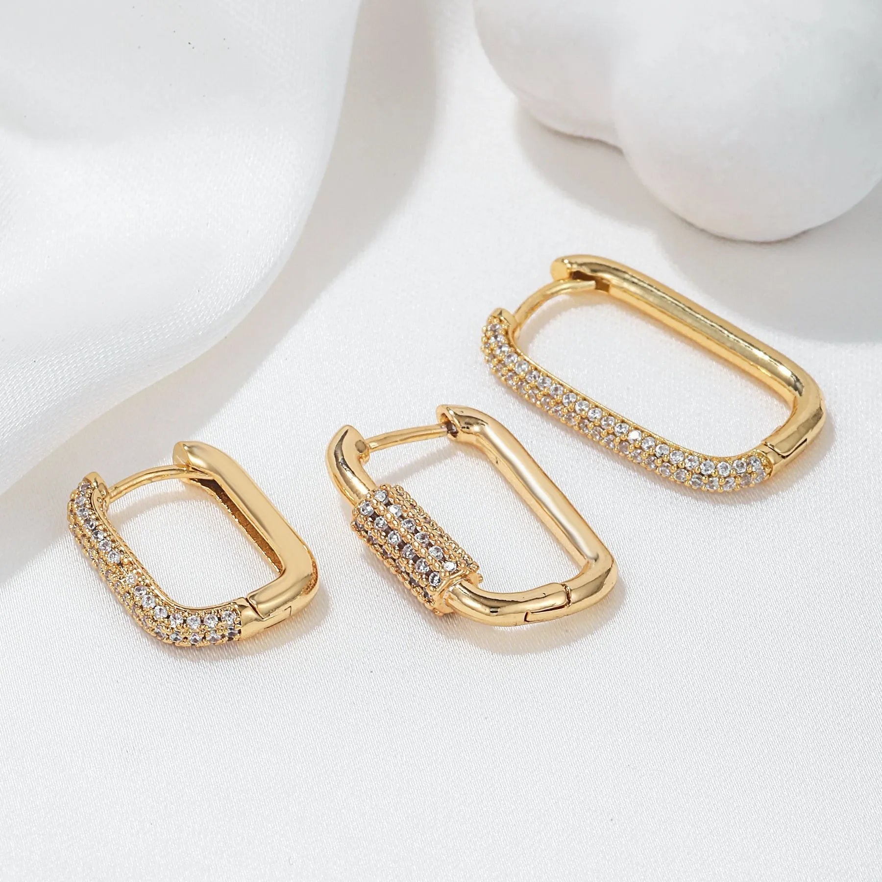 Geometric three-piece copper ear clip set with micro inlaid zircon detailing in gold or white finish