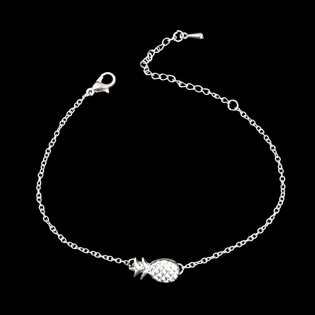 Women's gold tone alloy bracelet with a detailed pineapple charm on an adjustable chain.