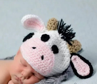 Hand-knitted white newborn cow suit with matching hat and trousers for 0-3 month babies