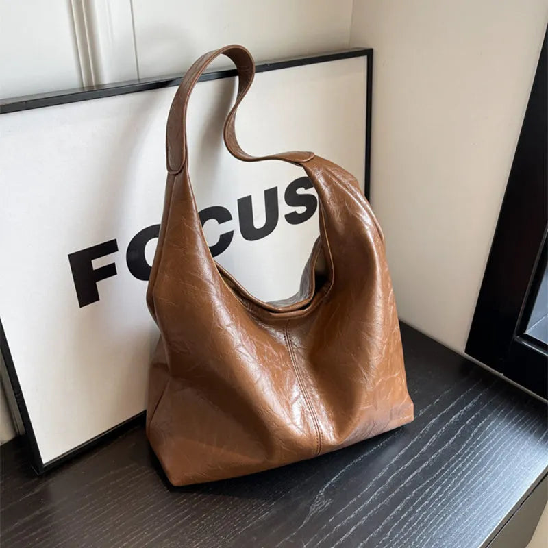 Two-piece composite bag set: large hobo shoulder bag and clutch in PU, available in five colours including black and dark brown