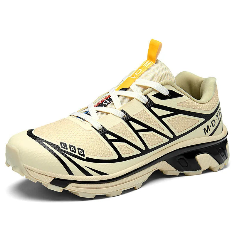 Low-top lace-up hiking shoes in artificial leather with a rubber sole and mesh lining.