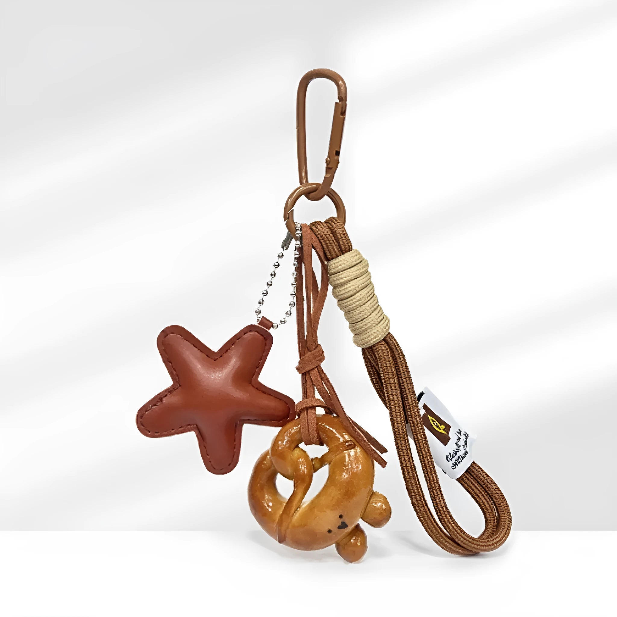 Handmade polymer clay soda bread handbag pendant with adjustable brown strap and glossy baking varnish finish