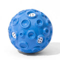 Colourful dog toy ball with textured meteorite bumps for teeth cleaning and squeaky sound