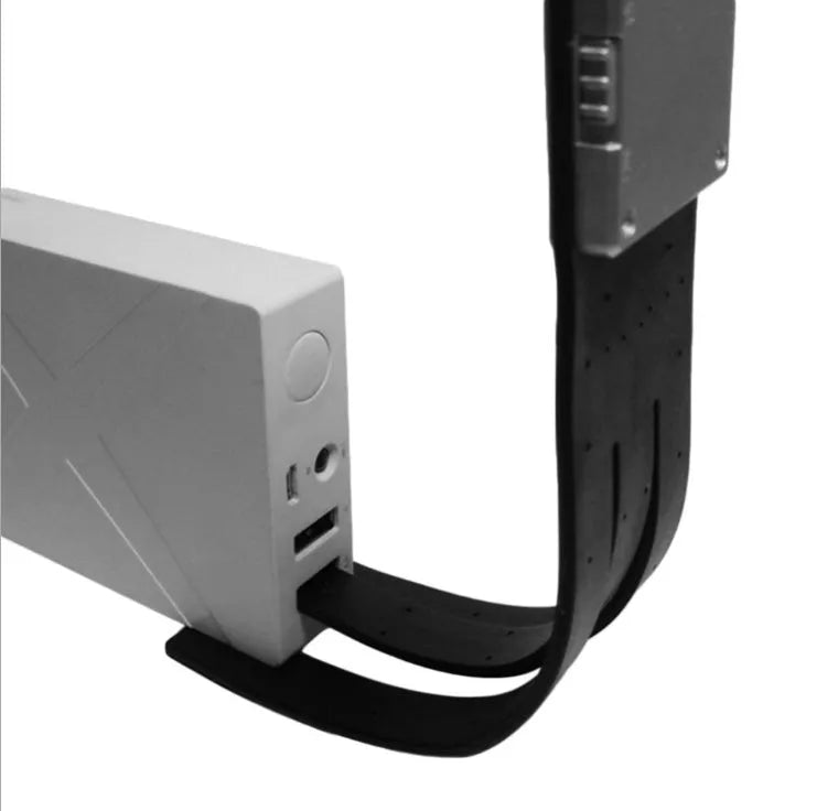 Black folding USB rechargeable LED reading light showing adjustable brightness settings