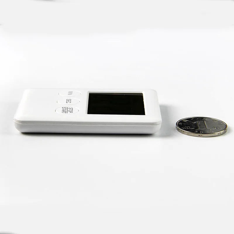 Magnetic kitchen timer in black and white colour options showing front display and magnetic back