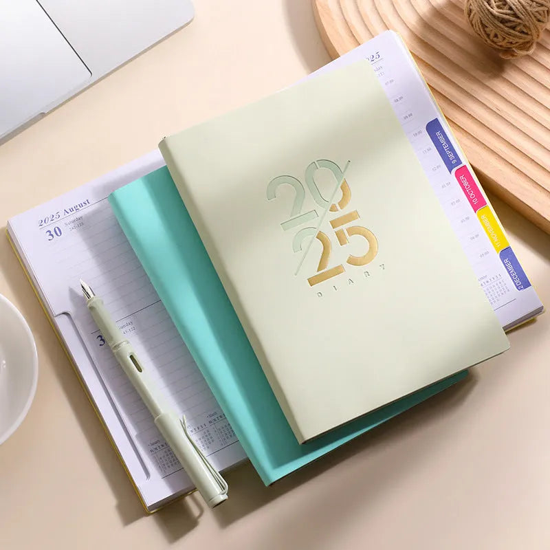 A5 faux leather daily schedule book open showing Dorian paper pages with binding detail