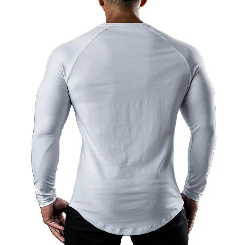 Men's tight-fitting long sleeve cotton sports t-shirt in multiple colours for exercise.