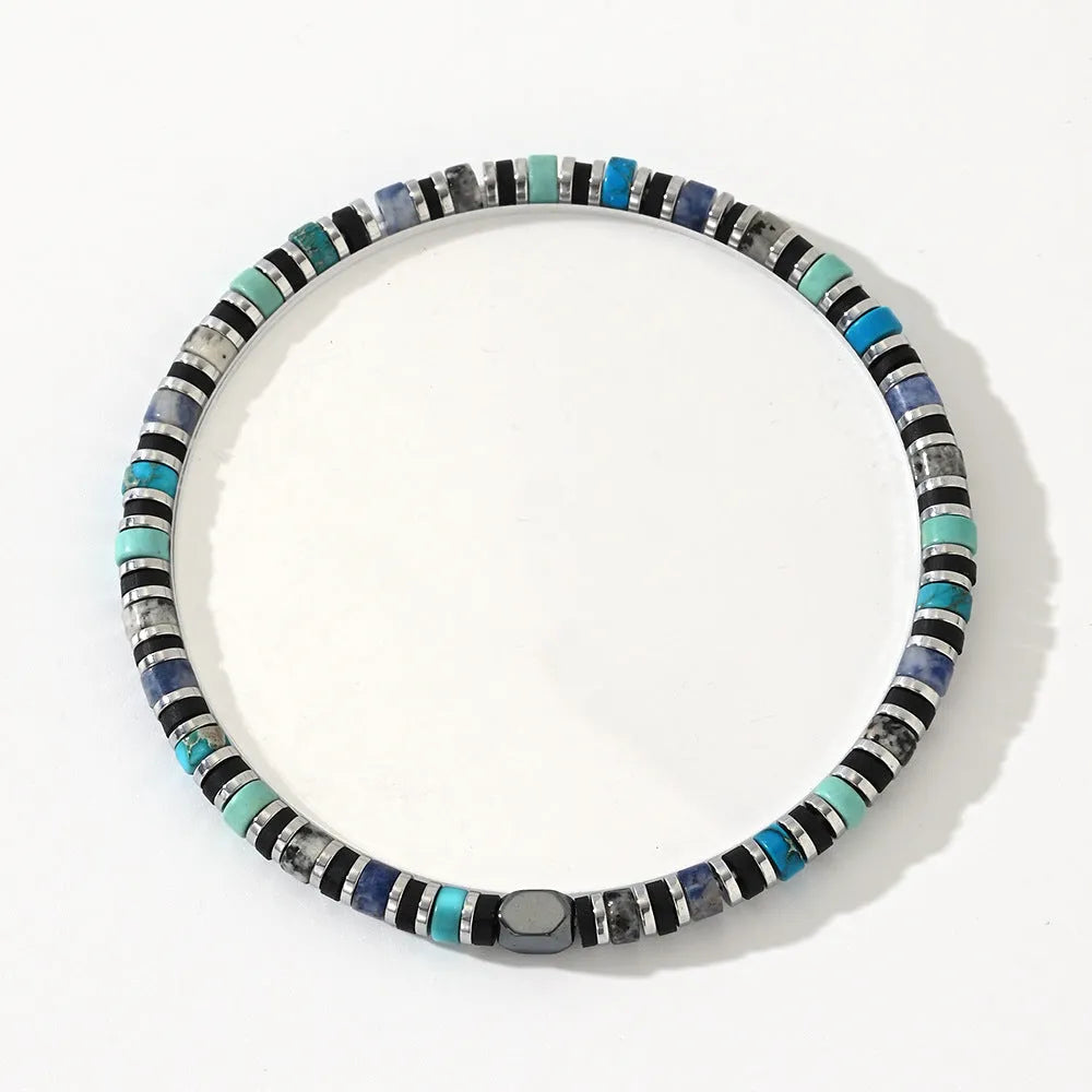 Hand-woven bohemian bracelet with semi-precious stones in geometric cylindrical bead design