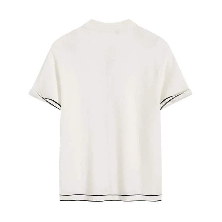 White women's cardigan with contrasting colour lapels and short sleeves.