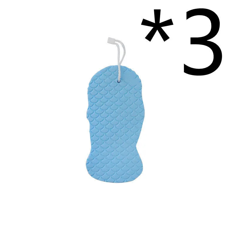 White 3D fish scale pattern bath sponge ball for gentle body exfoliation in the shower.