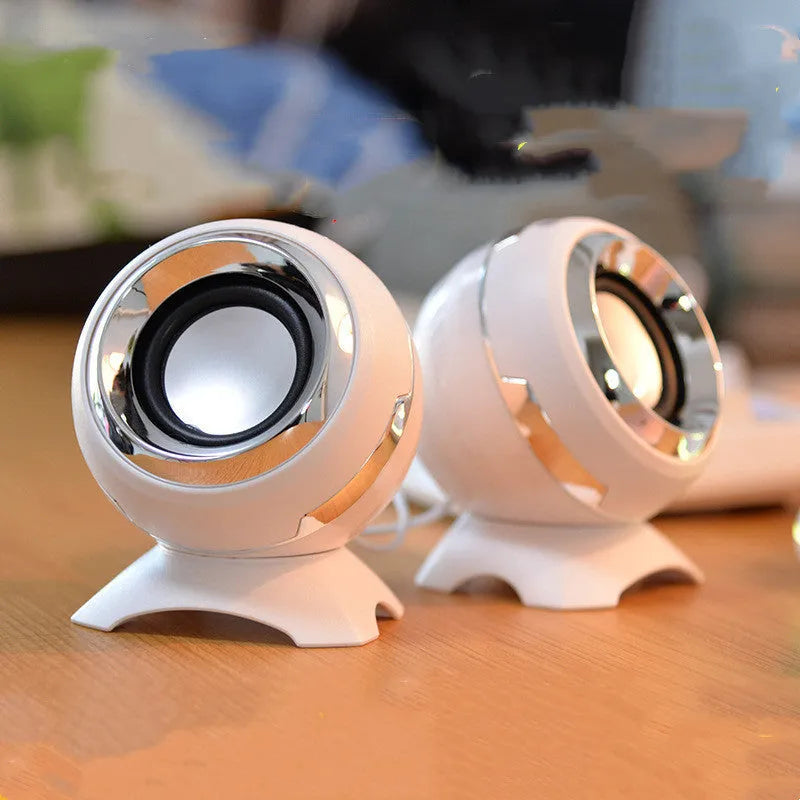Pair of compact desktop speakers with USB cable and 3.5mm audio connection