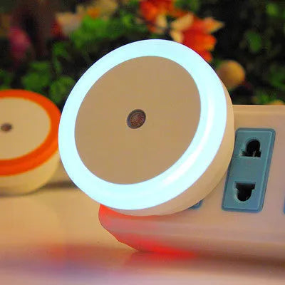 Round halo LED induction lamp showing blue, red, white, and yellow colour options for portable use.