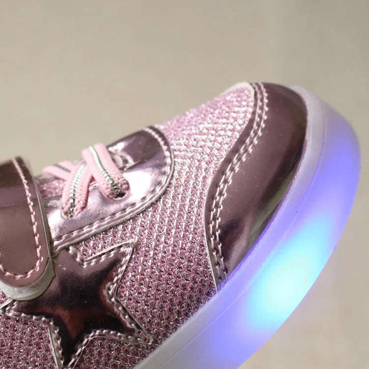 LED children's trainers with magic button switch showing colour changing lights and flashing heel illumination