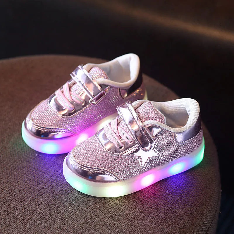 LED children's trainers with magic button switch showing colour changing lights and flashing heel illumination