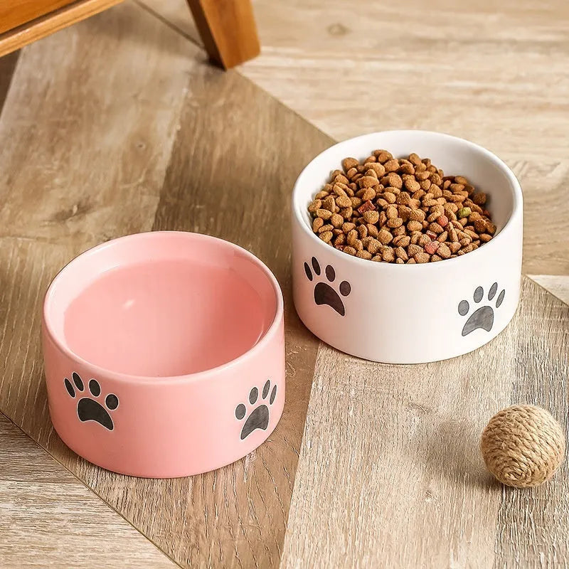 Ceramic cat food bowl with high foot and cat's paw pattern in chosen colour
