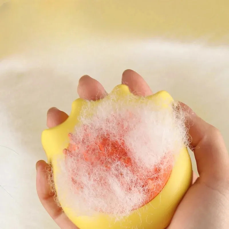 Pet bath brush with shampoo compartment in blue, orange, or yellow measuring 9x8x5.3cm