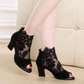 Women's black lace gladiator sandals with square high heels and zip closure