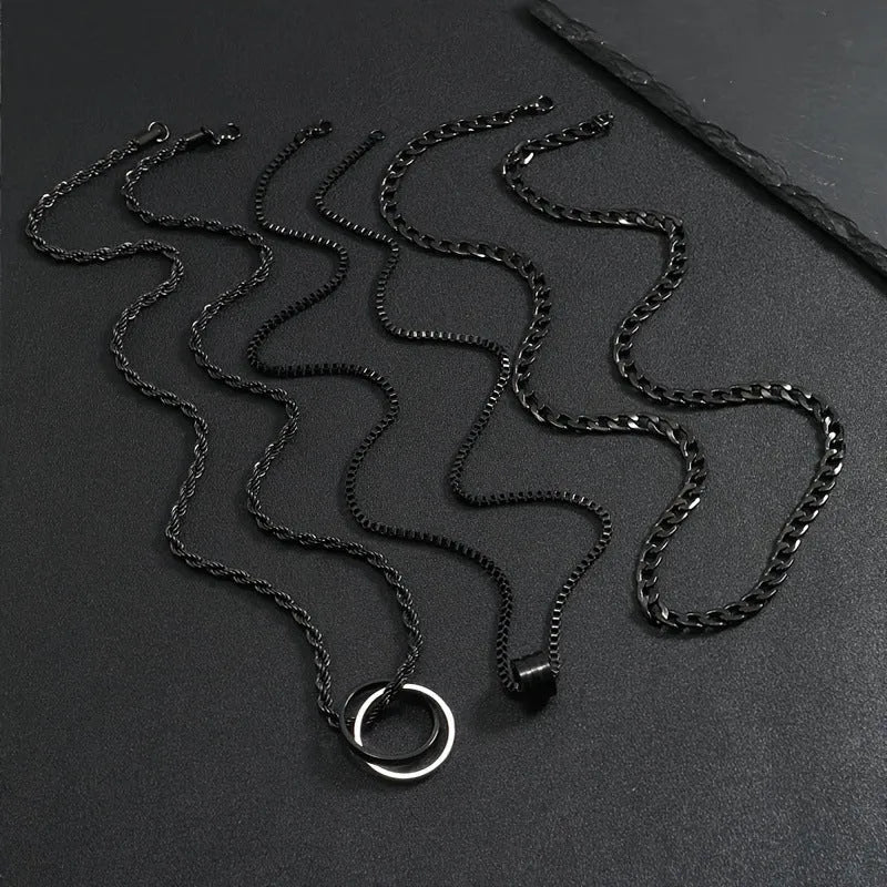 Men's black stainless steel necklace set with geometric titanium steel pendant.