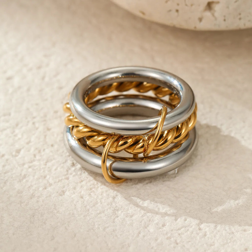 Gold plated stainless steel stackable ring set in three colour options for women