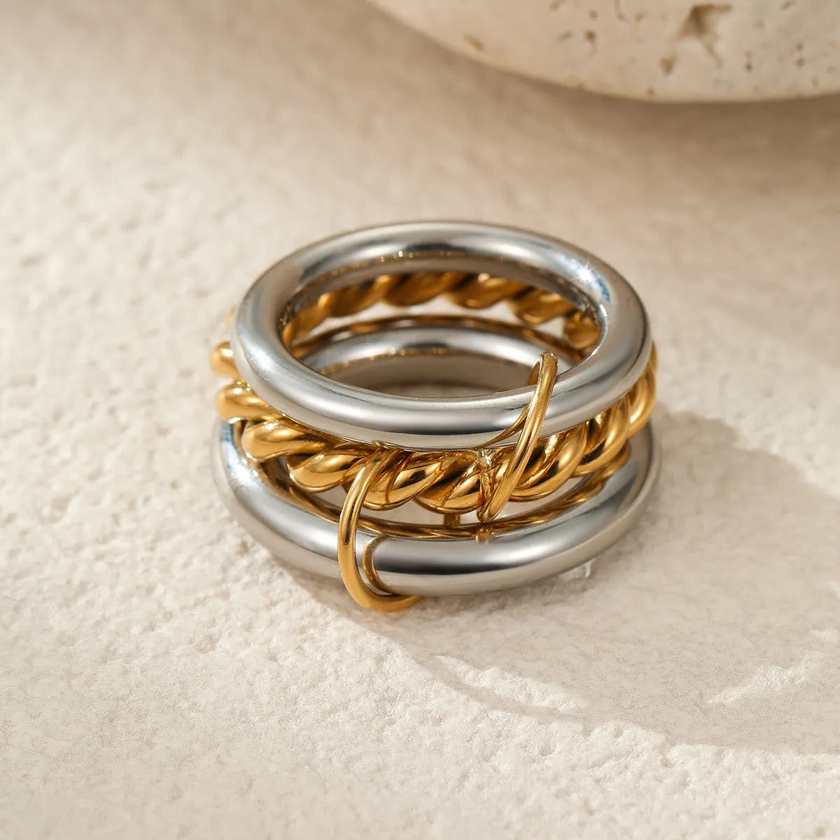 Gold plated stainless steel stackable ring set in three colour options for women