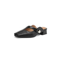 A pair of casual square-toe low-heel slippers in a solid colour on a rubber sole.