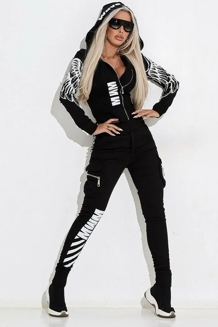 Black women's hooded tracksuit with wings print, featuring a zip-front top and matching trousers.