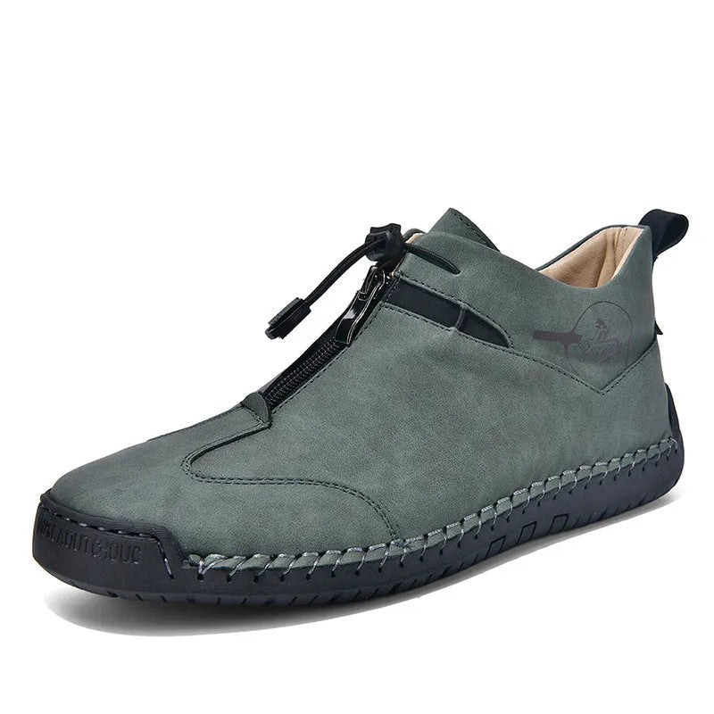 Men's black casual leather shoes with a round toe, tall crown, and a rubber sole.