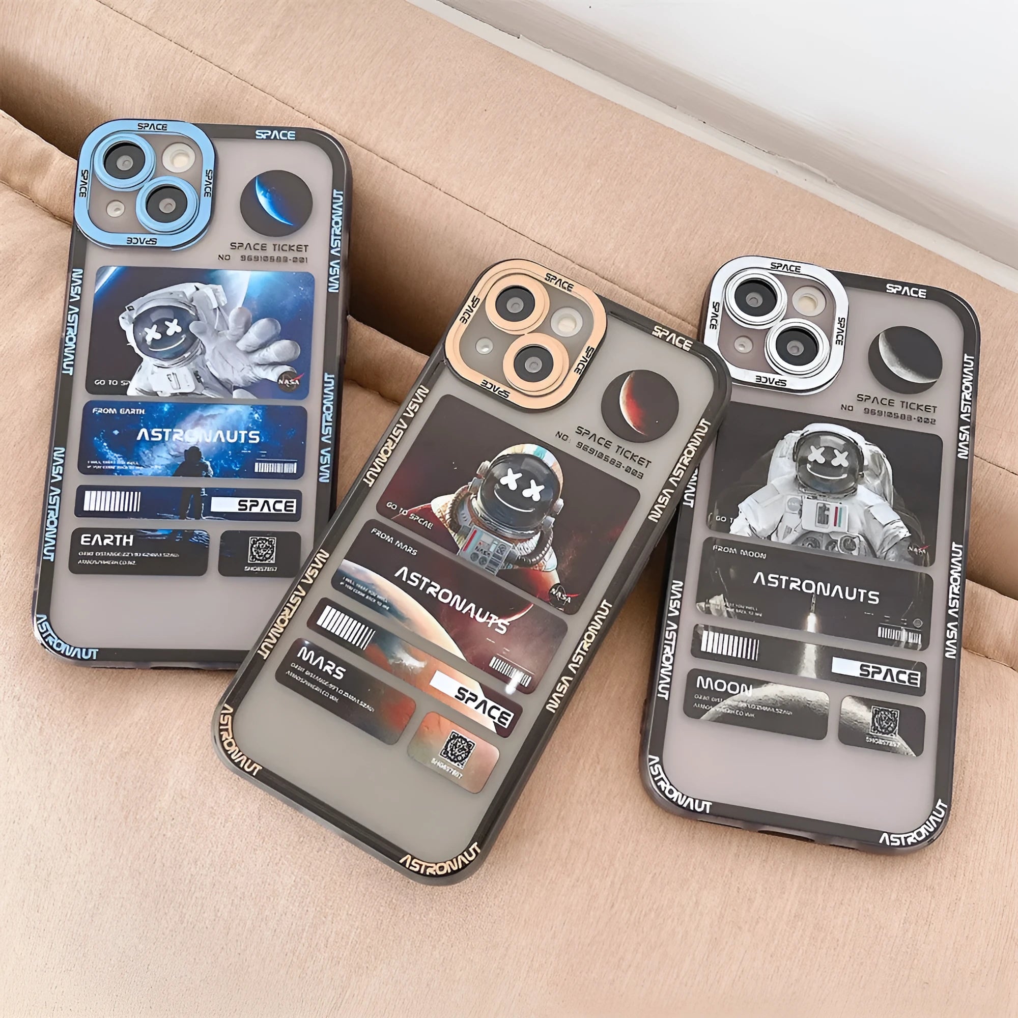 Blue-black silicone iPhone case with a graffiti-style space astronaut print, shown on an iPhone.