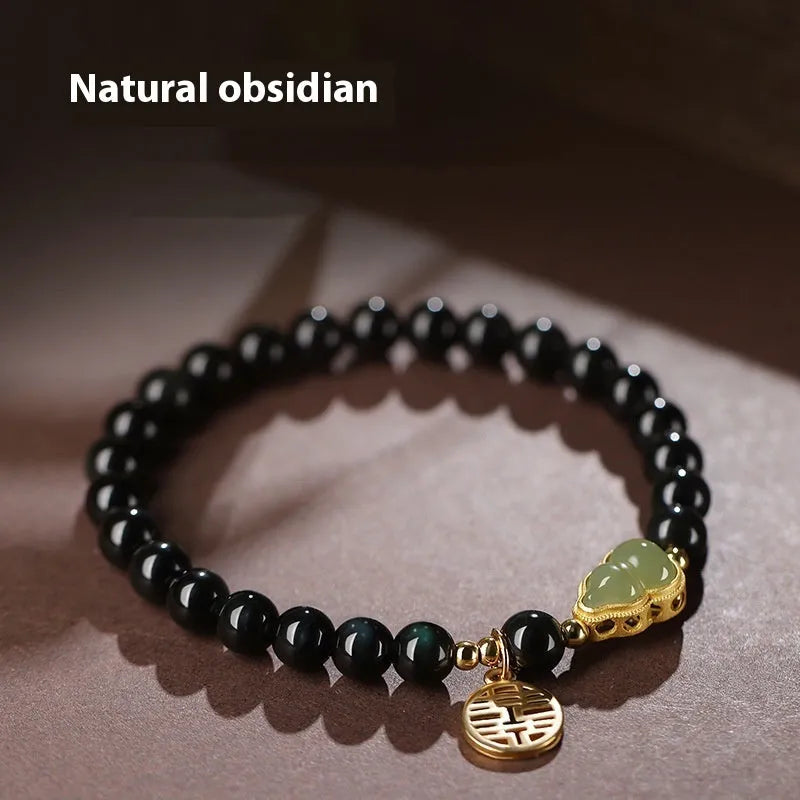 Natural black obsidian bracelet with Hetian jade gourd pendant in geometric bead design