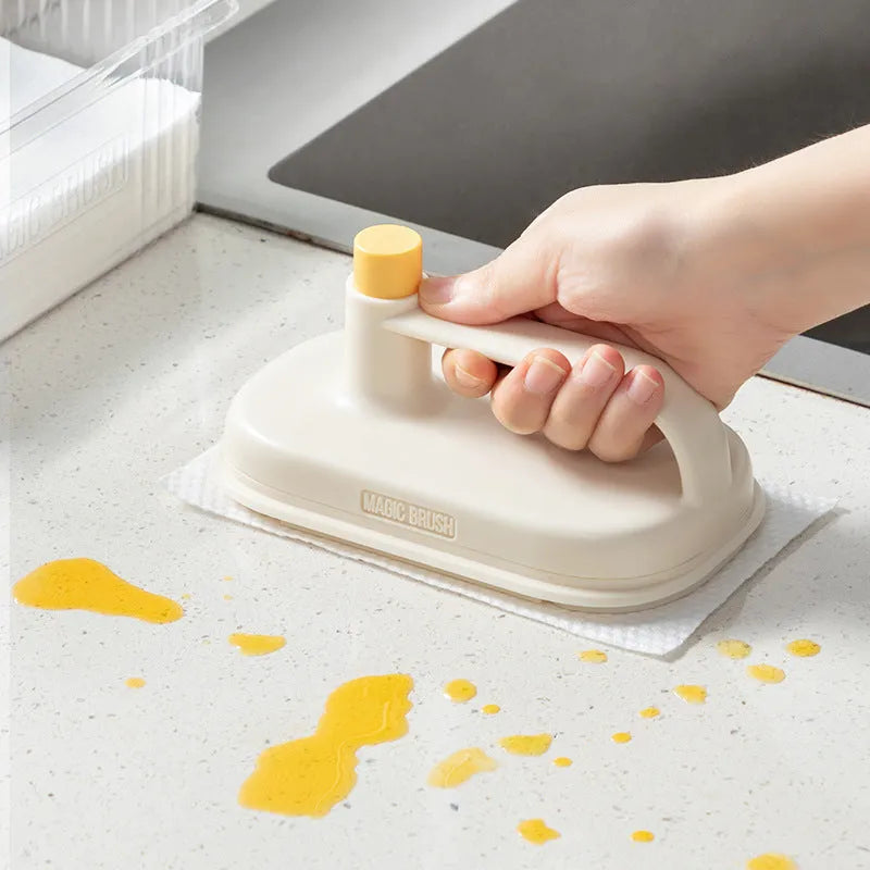 Magic Brush disposable cleaning tool with plastic handle, 50 white non-woven rags, and a storage box holder.