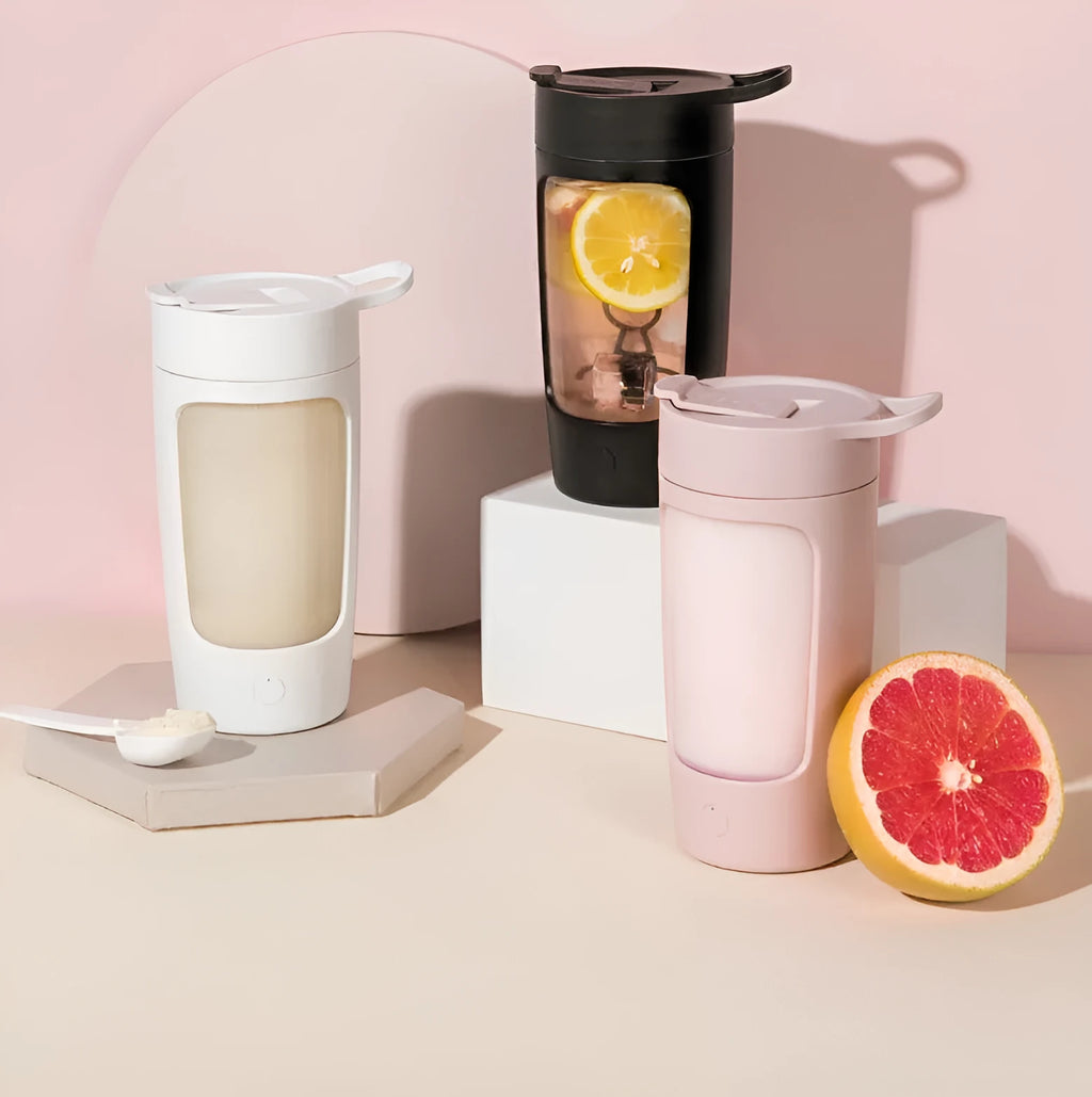 Automatic mixing cup portable juice blender in black, blue, pink, and white colours showing 650ml capacity