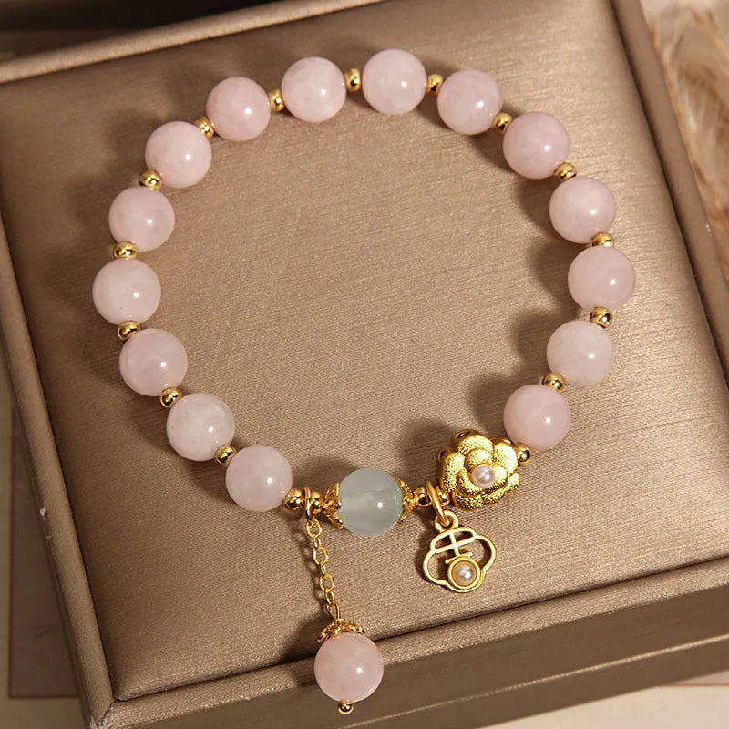 Women's pink crystal flower bracelet with refined graceful design on wrist