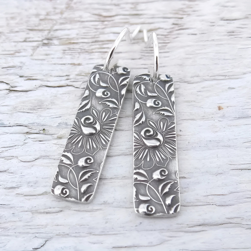Silver geometric long earrings with carved vine design in retro style
