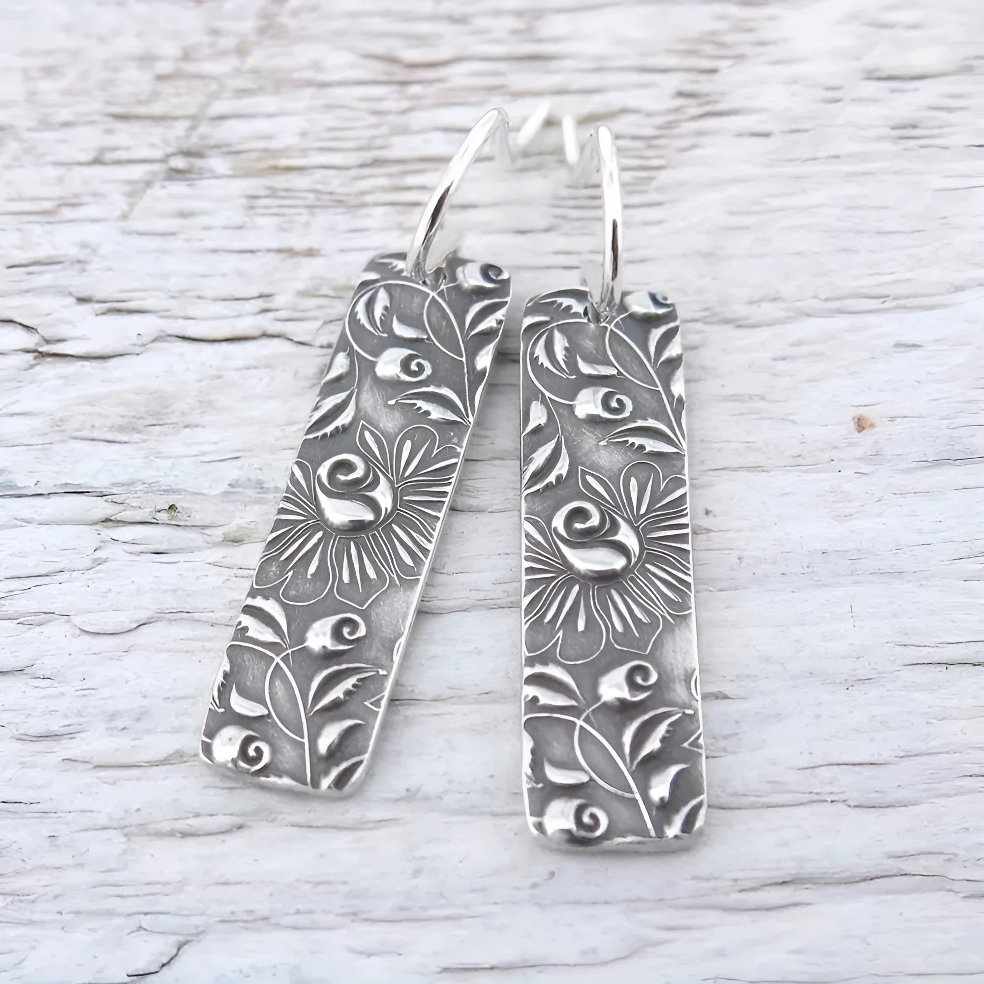 Silver geometric long earrings with carved vine design in retro style
