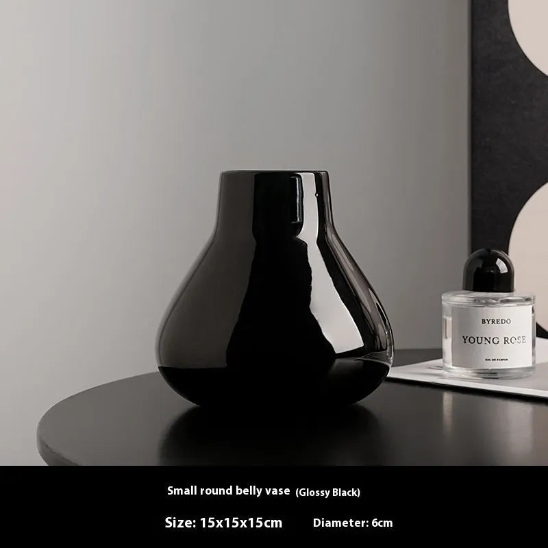 Ceramic vase with glass surface in black or white colour featuring coloured glaze finish and modern simple style