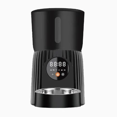 Black and white automatic pet feeder with smartphone app showing feeding schedule