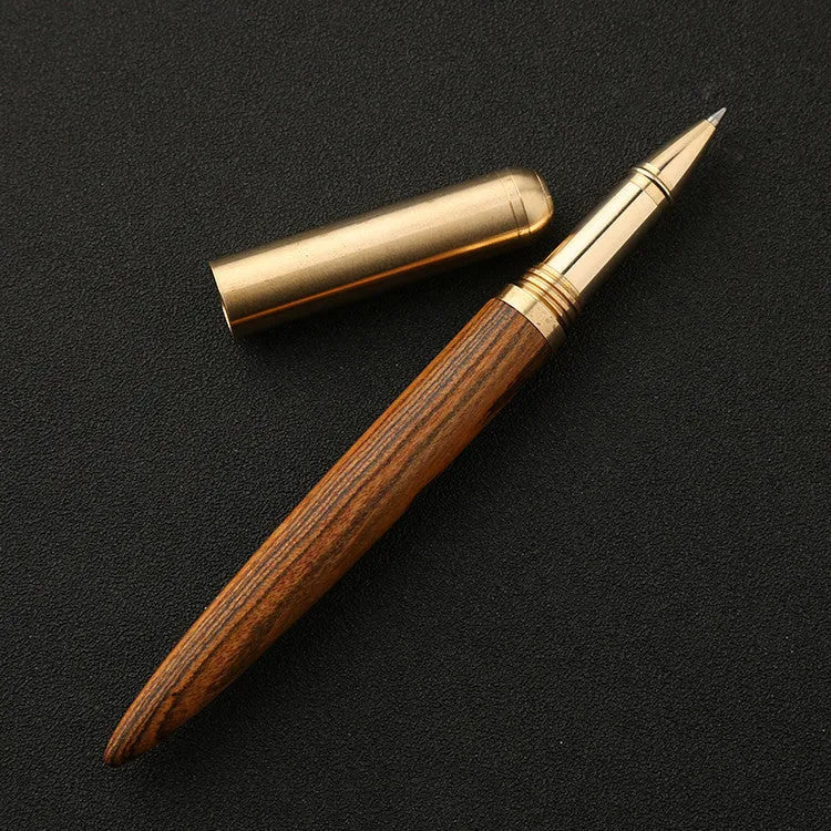 Brass and sandalwood signature pen with wooden barrel, shown alongside a ruler indicating 14 cm length.