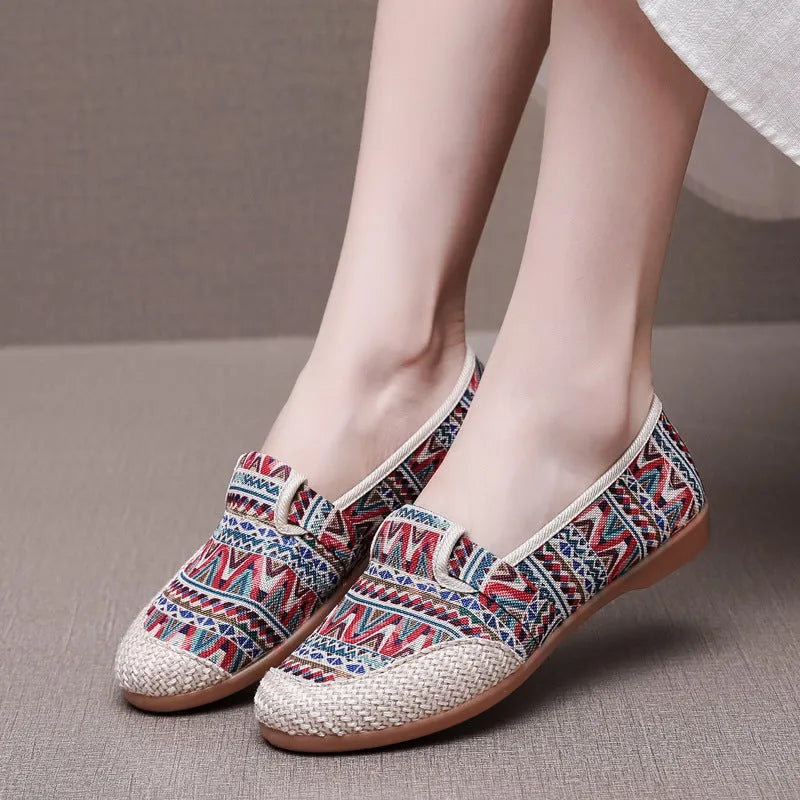 Women's ethnic style cloth shoes with colour stitching, cotton lining, and flat heel in shallow mouth design
