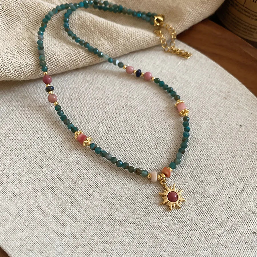 French court style freshwater pearl necklace with sun pendant on adjustable clavicle chain