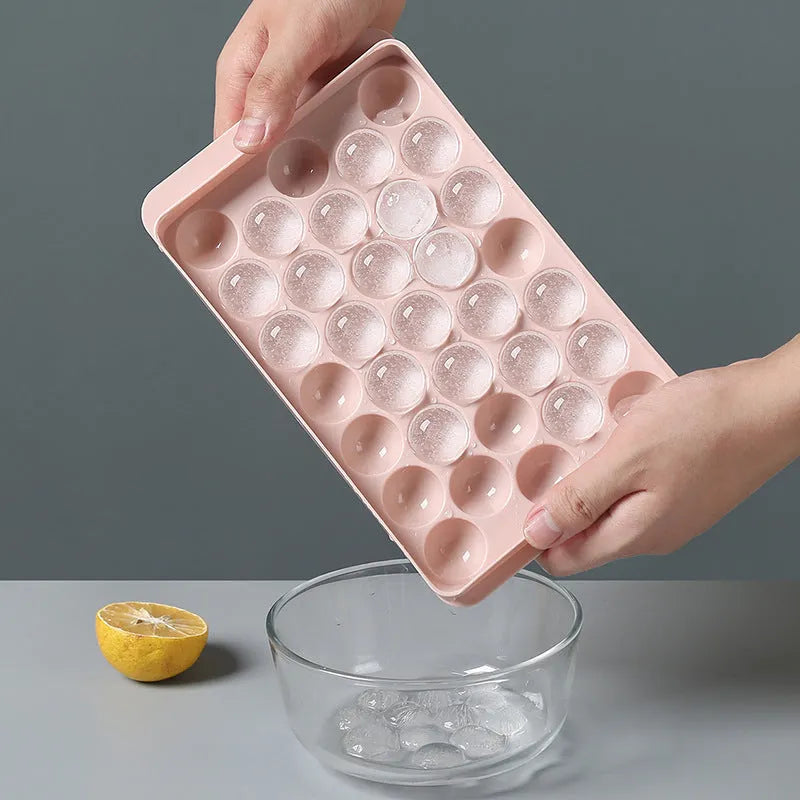 Sky blue 3D round ice ball mould tray with spherical ice cavities for home bar use