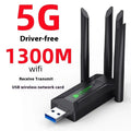Black USB network transmitter with four extended antennas for wireless signal coverage