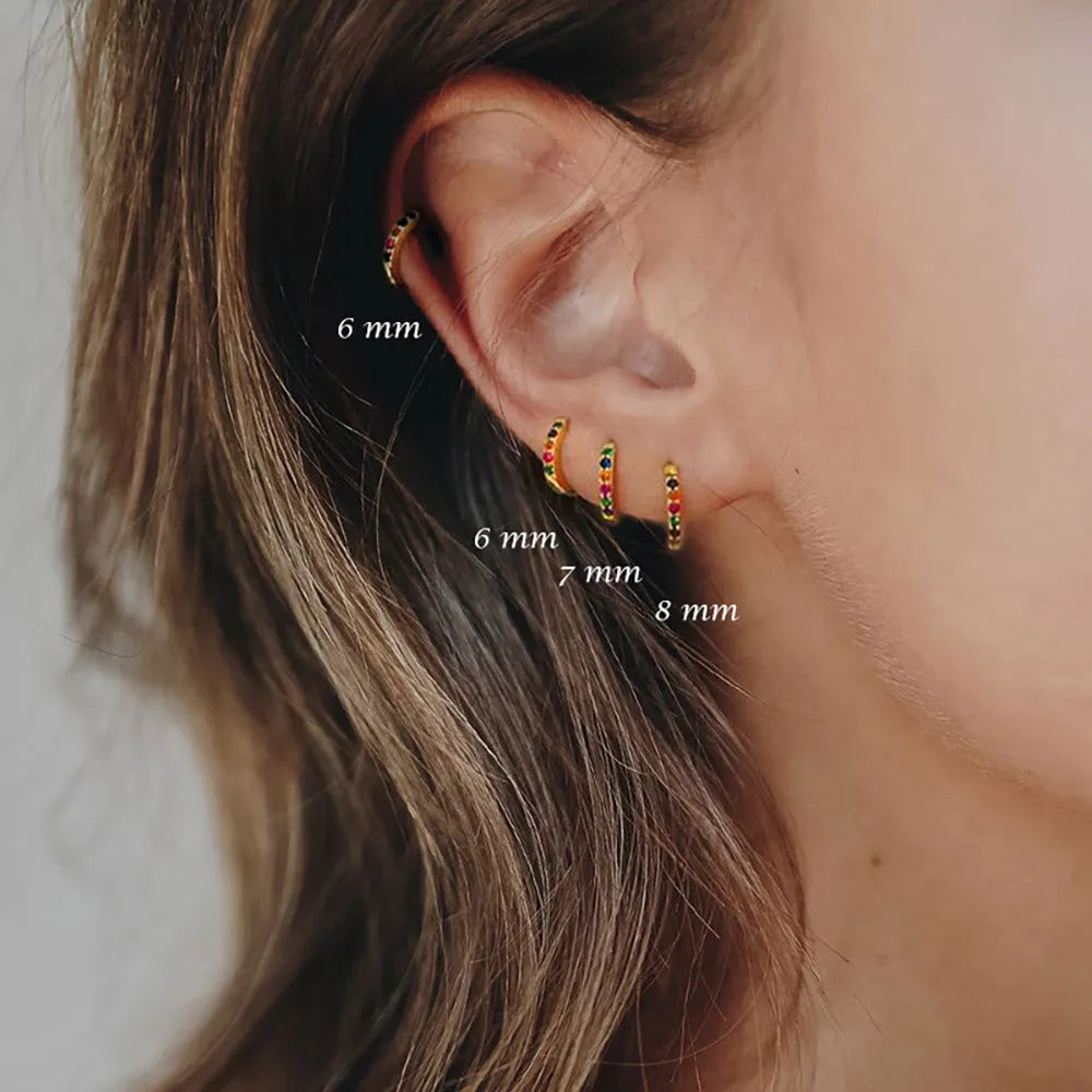 Geometric perforated stud earrings with circle zircon decoration in gold, rose gold and silver colours