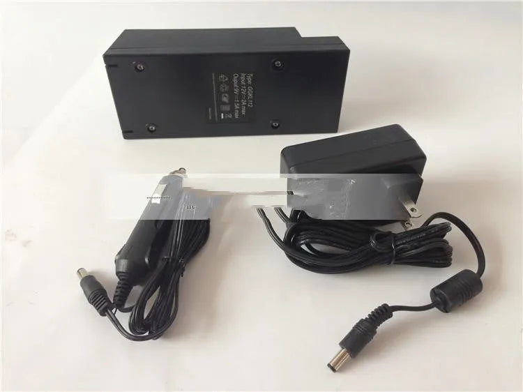 GKL112 model black USB car charger adaptor with UK plug for 220V vehicle installation.