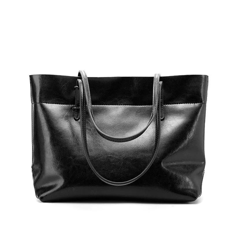 Brown leather crossbody handbag with multiple internal compartments showing dimensions 30cm wide by 37cm high.
