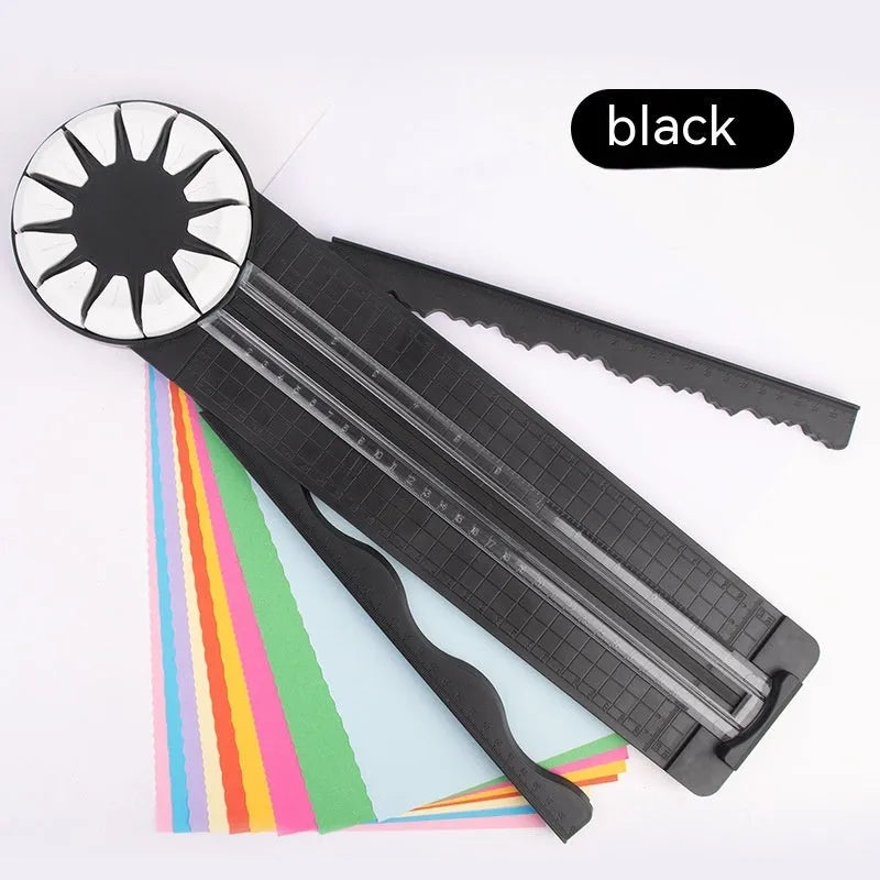 Pink and black 12-in-1 multifunctional plastic paper cutting machine on a white background.
