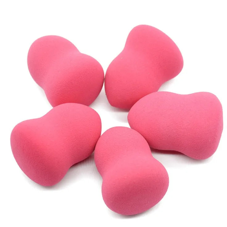 Pink non-latex makeup foundation sponge for wet or dry application measuring 4x4x5.6 cm