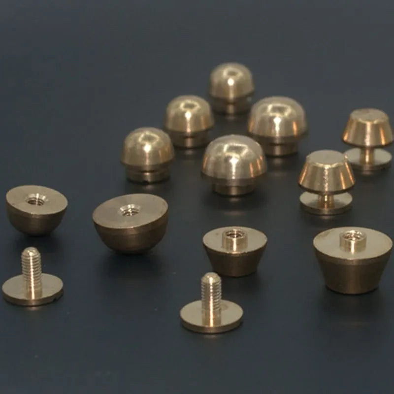 Brass decorative buckle and foot nail jewellery findings in 10x6mm and 12x7mm sizes.